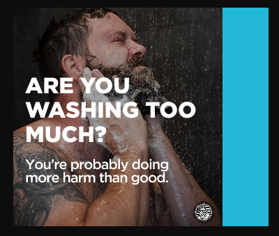 Image of Charlie, CEO, using Badass Beard Wash to clean and refresh his beard.